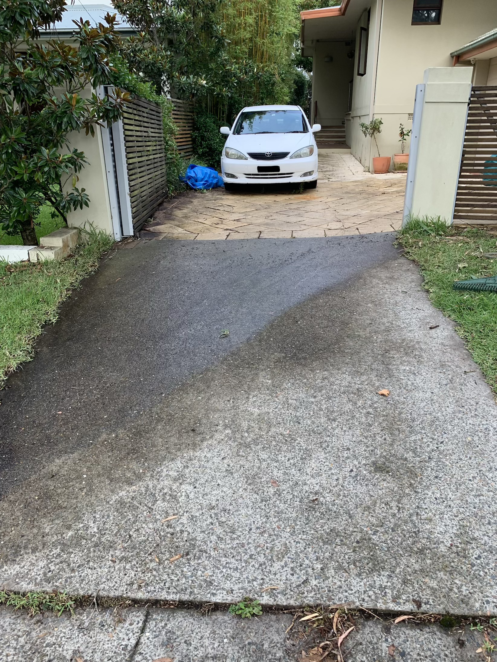 Driveway cleared of storm debris, after removal